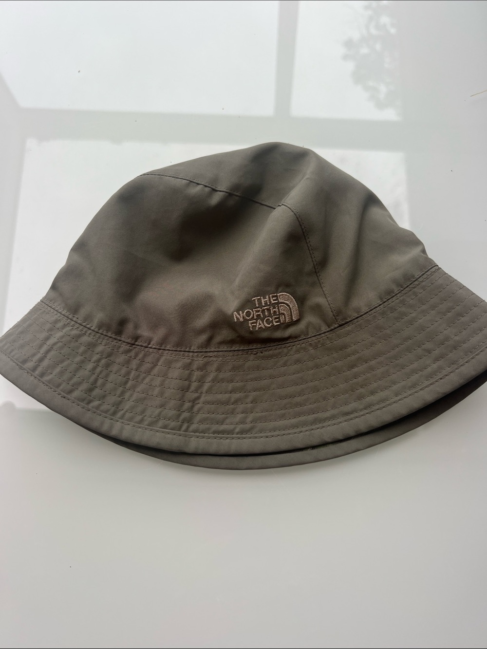 The North Face Reversible Olive Bucket Hat with Embroidered Logo